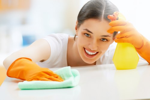 Protective gloves and cleaning PPE used during carpet cleaning