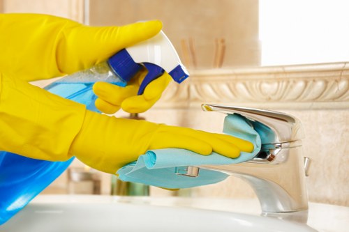Office cleaners working in a W11 business reception area