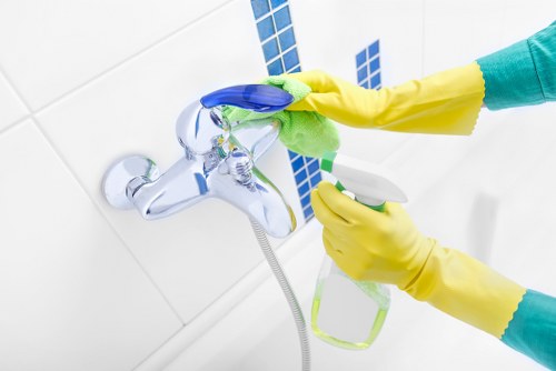 Office cleaning team maintaining workspaces in W11